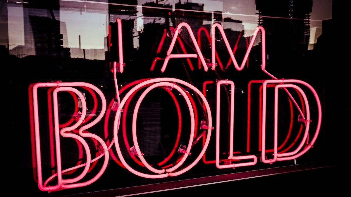 I Am bold neon signage at night time